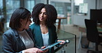 Business, people and talk with tablet in office for planning, financial report and review budget. Women, discussion and digital on stairs for teamwork, finance feedback and information for investment