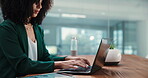 Business woman, laptop and corporate office for typing, bookkeeping and online accounting. African person, technology or accountant on internet for finance communication, payroll or email of budget