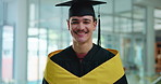 Man, face and happy with graduation cap, university goals and pride for achievement in education. Person, college student and smile in portrait with robe, success and celebration at campus in Italy