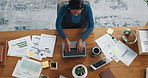 Top view, laptop and business woman typing in office for accounting document or investment. Above, computer and African worker writing report for bookkeeping, financial performance or budget proposal
