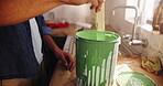 Renovation, hands and mixing paint in home for kitchen upgrade, diy makeover or remodeling. Homeowner, interior design and man with custom color for house improvement, maintenance or creative process