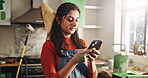 Phone, smile and remodeling with woman in kitchen for subcontractor research, project and paint idea. Home improvement, renovation and diy supplier contact with person in house for communication