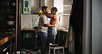 Black couple, dance and smile in kitchen for home renovation, upgrade and bonding. New house, paint supplies and people happy for makeover with fun, support and care with teamwork for love and diy