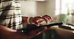 Hands, search and tablet with person in home for connectivity, information or online planning. App, scrolling and social media with man in kitchen of apartment for networking or website browsing