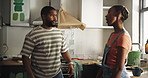 New home, frustrated and black couple with renovation, conversation and stress with paint in kitchen. People, argument and man with woman, property interior or fighting with conflict, angry and upset