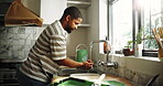 Washing, hands and man in home, disinfection and paint removal with water in kitchen, fresh or sink. Clean, color and black person with soap for hygiene, painter and rinsing dirt in house and liquid