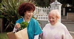 Smile, nurse and help with old woman and grocery for support, occupational therapy and trust. Healthcare, nutritionist advisor and caregiver with people in nursing home for retirement and kindness