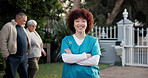 Happy woman, face or caregiver with confidence for assisted living, service or retirement home. Portrait, female person or nurse with smile or arms crossed at facility for healthcare or elderly care