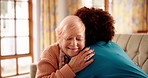 Support, nurse and old woman with hug in home for healthcare advice, bonding and medical service. Retirement, caregiver and embrace senior person on sofa for kindness, assisted living and assistance