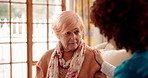 Old woman, support or nurse with empathy in home for bad news, medical results or health diagnosis. Consulting, caregiver and senior patient with comfort on sofa for cancer disease, trust and advice