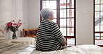 Home, thinking and old woman with retirement, bedroom and memory with dementia. Apartment, pensioner and senior person with wonder, nostalgia and depression with contemplation, sad and alzheimer