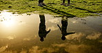 People, lake and stretching with silhouette in nature for fitness, workout preparation or exercise. Man, woman or water reflection of active runners in warm up by pond for physical activity together