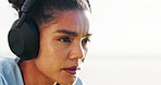 Breathe, fitness and woman with headphones outdoor for running, marathon training and exercise. Sports, runner and person with music rest for fatigue, tired and break for workout, endurance and race
