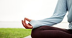 Woman, hands and nature with meditation for inner peace, zen or mindfulness on grass field. Closeup, female person and meditating with mudra for chakra, mantra or spiritual awareness on mockup space