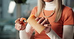 Atmosphere, candle and hands of woman in spa for holistic healing, tranquility or zen closeup. Ambience, aromatherapy and lighting with masseuse in health clinic, getting ready for wellness treatment