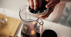 Blueberries, blender and woman with smoothie in kitchen for liquid breakfast with diet, health or wellness. Nutrition, fruit and hands of female person with beverage for morning meal in home. 
