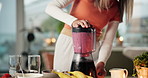 Blender, smoothie and woman in kitchen for health, diet and detox with vitamins, minerals and benefits. Home, wellness and person with drink, fruit shake and juice for protein, nutrition or digestion