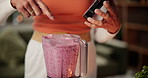 Blender, taste smoothie and mature woman in kitchen for health, diet and detox with vitamin benefits. Home, morning and person with drink, fruit shake and juice for protein, nutrition and digestion