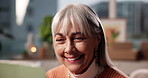 Senior woman, tablet and happy in home with streaming subscription, reading and contact in lounge. Person, tech and smile with application, scroll and relax with funny video in retirement at house