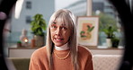 Ring light, face and woman with live streaming on sofa for social media vlog, recording and tips. Influencer, mature person and speaking to audience on video for content creation and advice in home