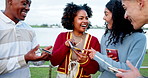 Woman, friends and phone with laugh at park with funny meme, post or story with point in nature by lake. Gen z people, men and group with girl, share and smartphone with comic video on social media