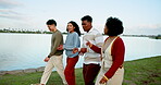 Smile, people and walk for vacation outdoor at lake, nature adventure and bonding together. Happy, group and travel with friends for holiday journey, social reunion and getaway trip for weekend break