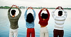 Friends, lake and back in nature, view and heart hands with sign, love and solidarity in nature. People, men and women with symbol, kindness and holiday with icon, water and support in countryside