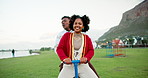 Face, laughing and fun with black couple on seesaw together for bonding, dating or romance outdoor. Happy, love or relationship with funny man and woman at lake in nature park for playful activity