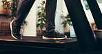 Feet, treadmill and walking with person in home for activity, exercise or fitness routine. Physiotherapy, rehabilitation and wellness with legs in apartment for action, cardio training or health