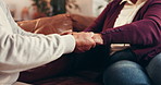 Senior couple, holding hands and sofa with love for empathy, commitment or comfort in home. Closeup, elderly man and woman with touch or support for trust, loyalty or sympathy on couch in house