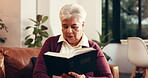 Bible, faith and retirement with senior woman on sofa in living room of home to study religion. Belief, reading book and relax with Christian person learning gospel in apartment for spirituality