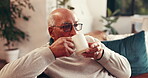 Remember, thinking or old man with tea on sofa in home for ideas, reflection or nostalgia. Decision, latte or elderly male person drinking beverage with past memory, coffee or peace in retirement