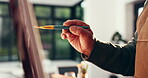 Painting, art and hands with paintbrush in home, creative or artist with canvas for craft or talent. Hobby, person and painter with tool for project, skills and color for design in house or studio