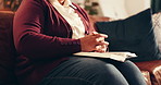 Hands, senior woman and pray with bible for grace, spiritual faith and connection to God. Elderly person, book and holy scripture for guidance, testament and religious belief in Jesus Christ at house
