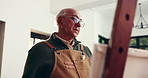 Artist, senior man and painting in home for inspiration, artwork and talent with easel. Elderly person, painter and art on canvas for retirement hobby, self expression and creative drawing with tools