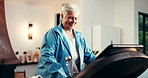 Senior woman, home and exercise on treadmill for wellness, walk or weight loss for body health. Elderly, workout machine and happy person training for fitness results or cardio for active retirement