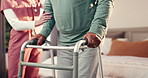 Nurse, hands and senior with walker for assisted living or help in bedroom or retirement home. Man, caregiver and aiding elderly person with a disability or patient for mobility, balance or recovery