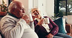 Happy, laugh and coffee break with old couple on sofa for bonding, romance and happiness. Smile, support and gossip with senior man, woman and living room of home for relationship and relax together