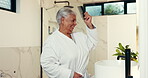 Smile, senior woman and brush hair in bathroom for grooming, growth benefits and beauty. Happy, elderly person and dance with tools for textures shine, scalp maintenance and morning routine at house