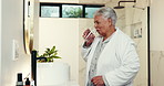 Senior woman, bathroom or medication with water for morning prescription or chronic illness in home. Elderly, female person or drinking mineral liquid with pills for medical symptoms or cure in house