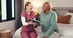 Tablet, checkup and nurse with senior man in home for research on treatment plan. Medical consultation, technology and caregiver with elderly male patient with diagnosis in bedroom at house.