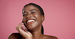 Black woman, beauty and smile for skincare, glow or cosmetics isolated on pink studio background. African model, health and happy for dermatology, wellness and skin treatment results with space