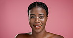 Face, skincare and beauty with happy black woman in studio for natural glow and confidence. Portrait, cosmetics and African model with facial treatment, shine and laughing on pink background space