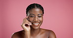 Face, skincare and dermatology with black woman in studio for beauty, glow or self care. Portrait, cosmetics and happy model with facial treatment, shine and skin texture on pink background space