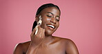 Makeup, brush and black woman with dermatology, facial and grooming in studio on pink background. Female person, aesthetic and happy model with cosmetic tools, shine and natural beauty with skincare