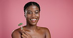 Skincare, black woman and face with jade roller in studio isolated on pink background for cosmetic. Beauty, relax and African girl with portrait for dermatology, treatment and lymphatic drainage
