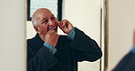 Senior man, mirror or teeth with dental floss for cleaning cavity, mouth or gum care in bathroom. Elderly, male person or smile with string or reflection for tooth hygiene or food removal in home