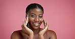 Face, black woman and cream application for skincare, moisturizer or sunscreen treatment for beauty. Glow, happy model and lotion for cosmetics, dermatology or sunblock on pink studio background