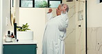 Senior woman, stretching and bathroom at house for wake up, getting ready and morning routine. Smile, elderly female person and arms up to start day with tying gown, stress relief and feeling fresh