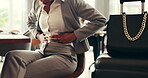 Stomach, pain and hands of woman in lobby with period ache in abdomen, ibs or travel medical emergency. Healthcare, business person and work trip with constipation, digestion or menstrual cramps